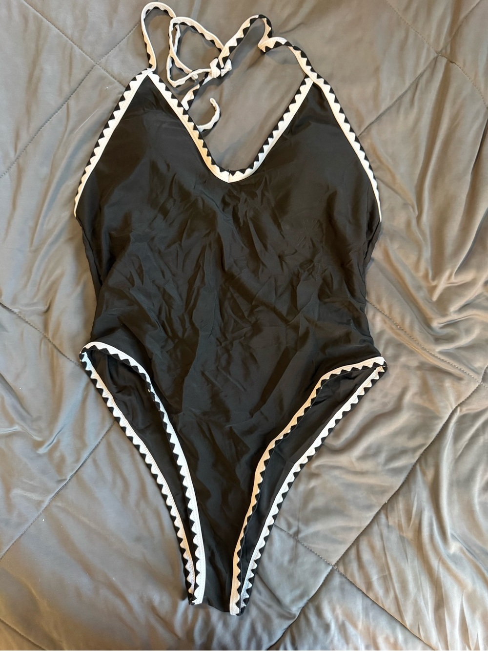 Black One-Piece Swimsuit with White Scalloped Trim